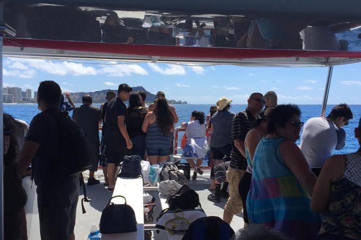 a group of people standing in front of a crowd