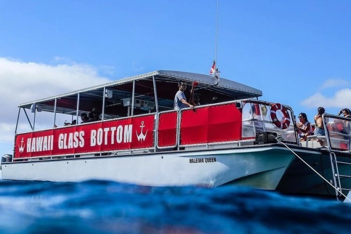 a person riding on the back of a boat