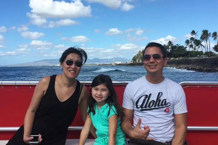 a group of people sitting posing for the camera