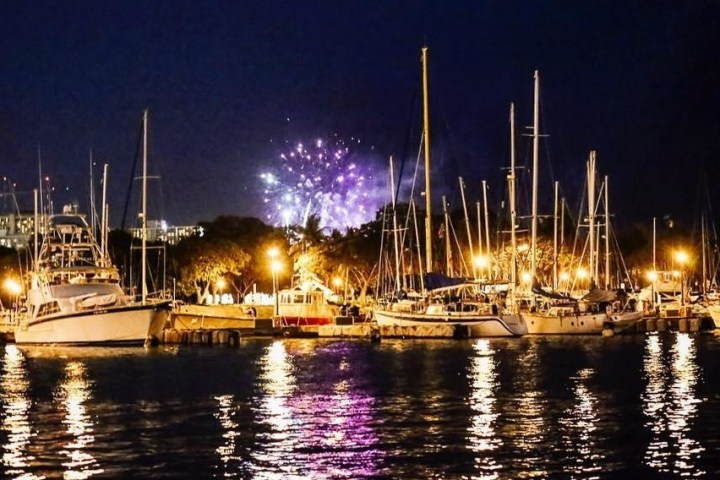 a boat docked at night