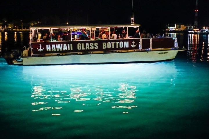 a boat is docked next to a body of water