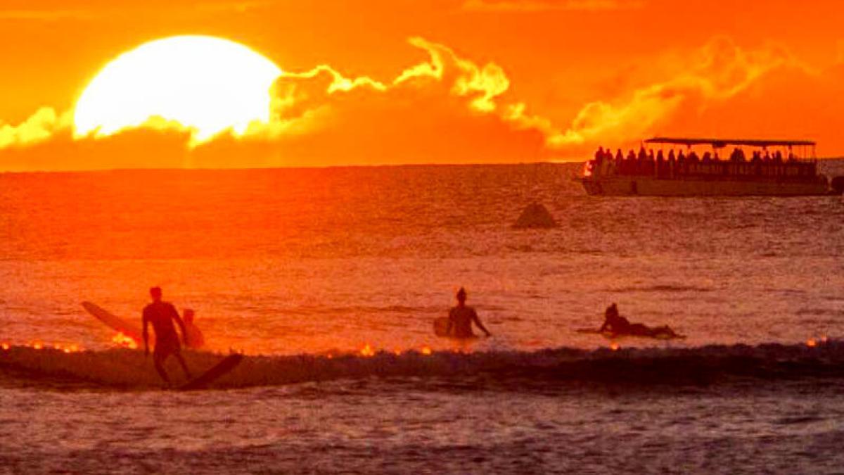 a sunset over a body of water