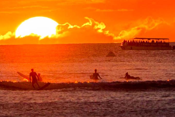 a sunset over a body of water