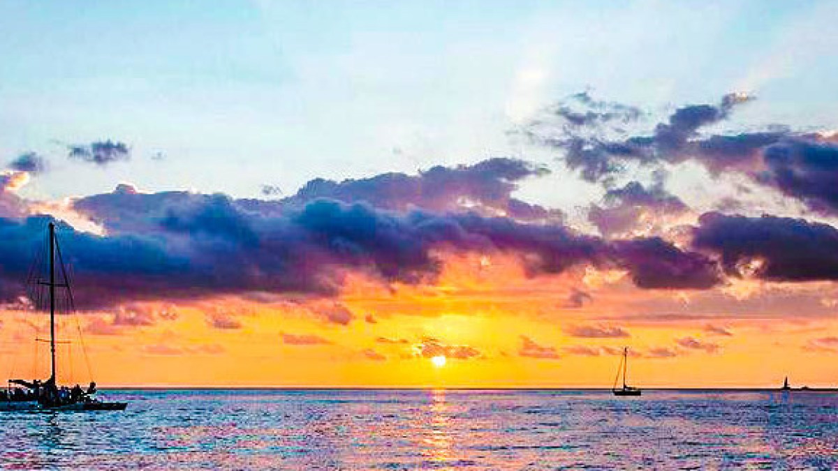 a sunset over a body of water