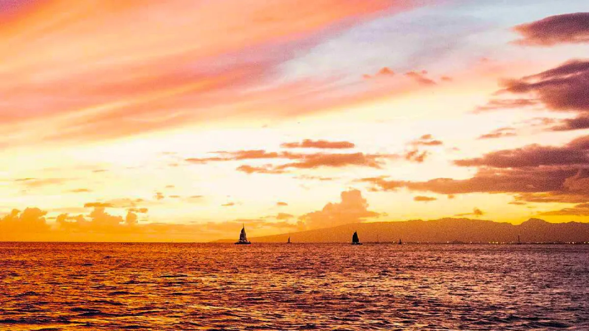 a sunset over a body of water